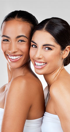 Beautiful young and diverse women smiling | ADVATx | Delmar Family Medicine Aesthetics