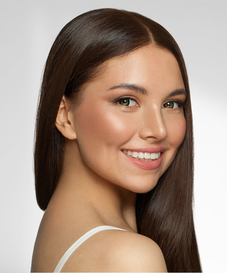 Beautiful young woman smiling | BOTOX | Delmar Family Medicine Aesthetics