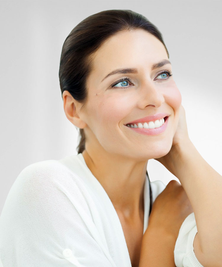 Beautiful middle aged woman smiling | Skin Rejuvenation | Delmar Family Medicine Aesthetics